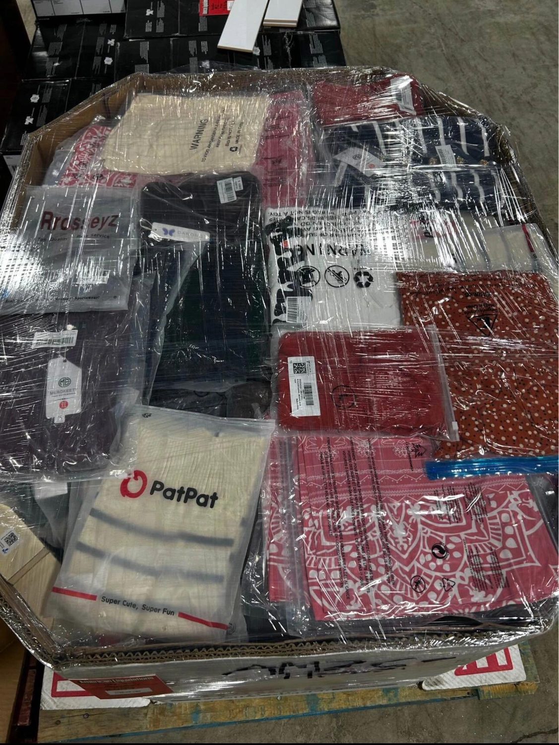 Assorted clothing garments packed for wholesale shipment